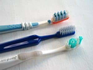 toothbrush sunset dental group brushing your teeth