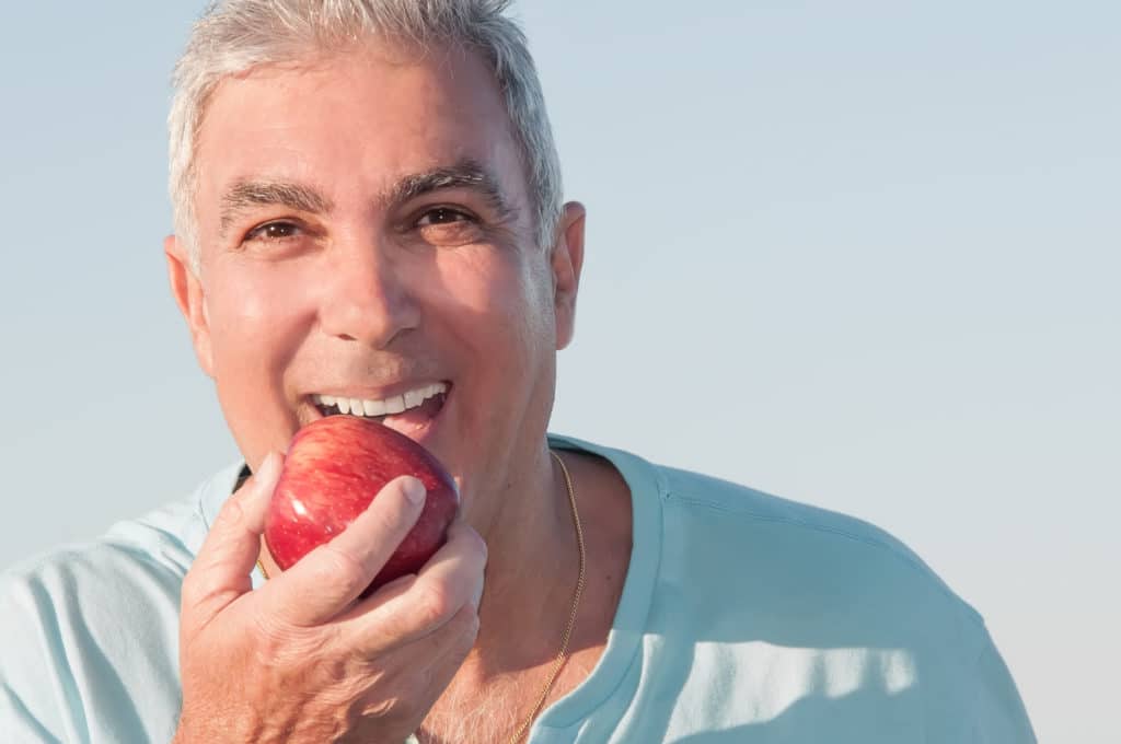 Man with an apple