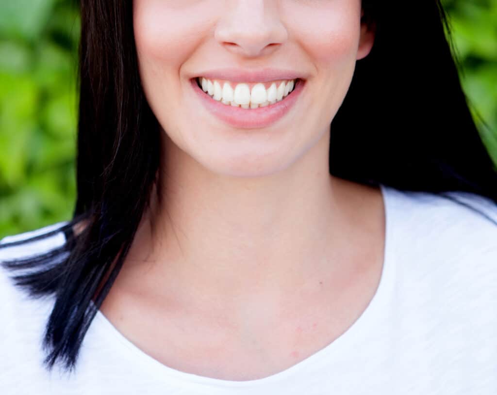 Why Can You Get Multiple Cavities In One Tooth? Sunset Dental Health women smile
